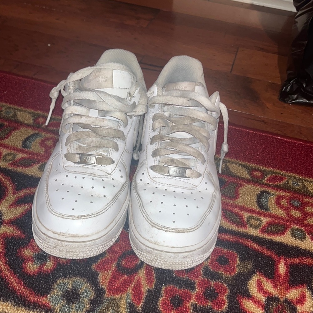 White Nike Air Force 1s. Womens 8. Stains on the laces.